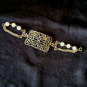 Intricate Gold and Pearl Women's Bracelet